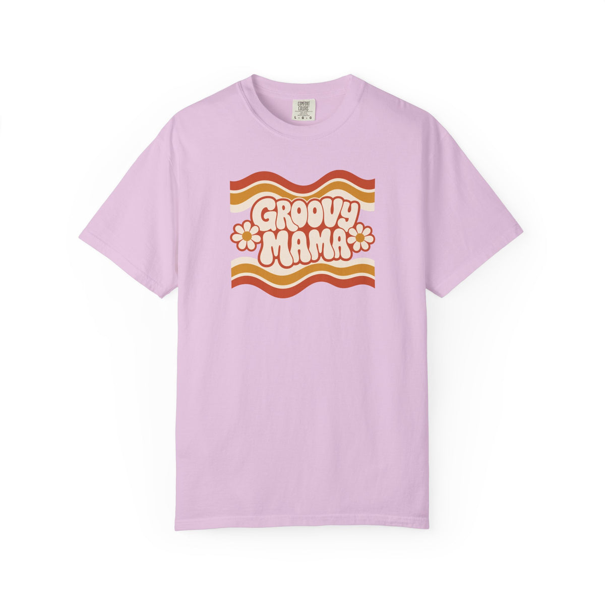 A light purple short-sleeve t-shirt with a retro 1970s-style graphic on the chest reading 'Groovy Mama' in cream with orange and yellow wavy stripes and flower details, displayed on a clean white background.