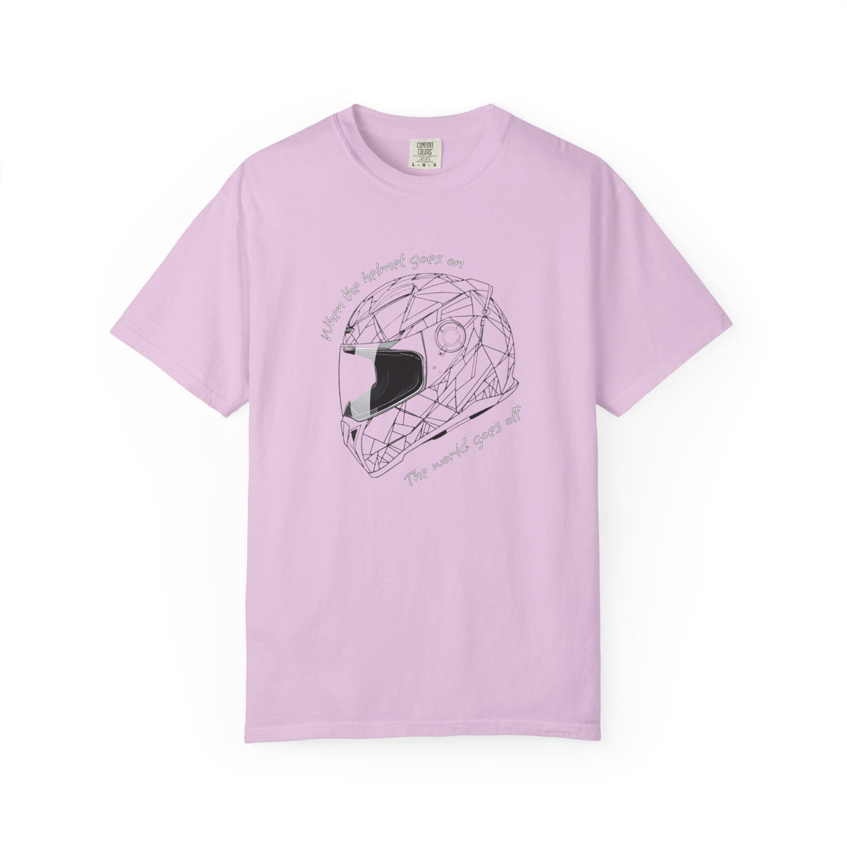 A pink short-sleeve crewneck t-shirt featuring a black line art graphic of a geometric motorcycle helmet in the center, with the text 'When the helmet goes on, the world goes off' curved around it.
