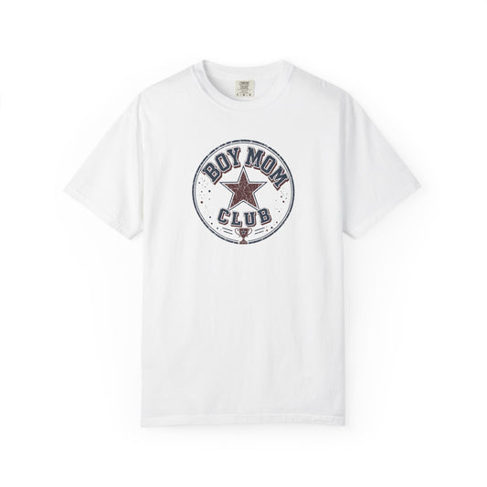 A white short-sleeve crewneck t-shirt featuring a circular vintage-style graphic on the chest that reads 'BOY MOM CLUB' around a central star.