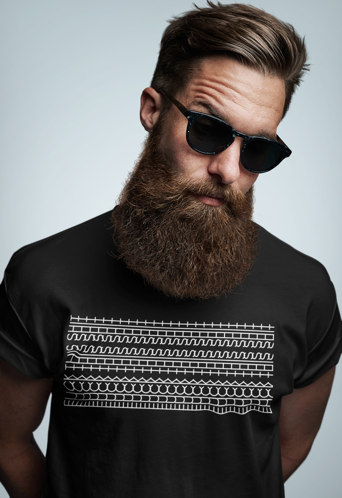 man wearing a black t-shirt with a fuck this shit patern on it