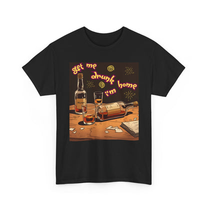 A black short-sleeve crewneck t-shirt featuring a colorful graphic print on the front. The graphic shows an illustration of whiskey bottles, glasses, and shattered glass on a wooden table, with the text 'get me drunk i'm home' in a wavy orange font.