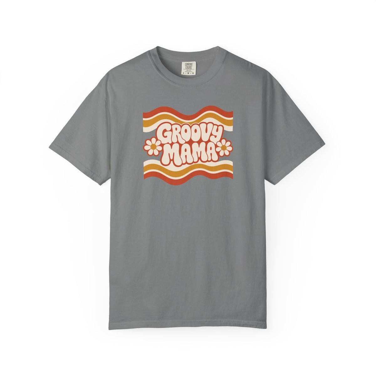 A gray short-sleeve crewneck t-shirt featuring a retro 1970s-style graphic on the chest with wavy orange, yellow, and white stripes, the text 'Groovy Mama' in pink bubble letters, and two pink-and-white daisies.