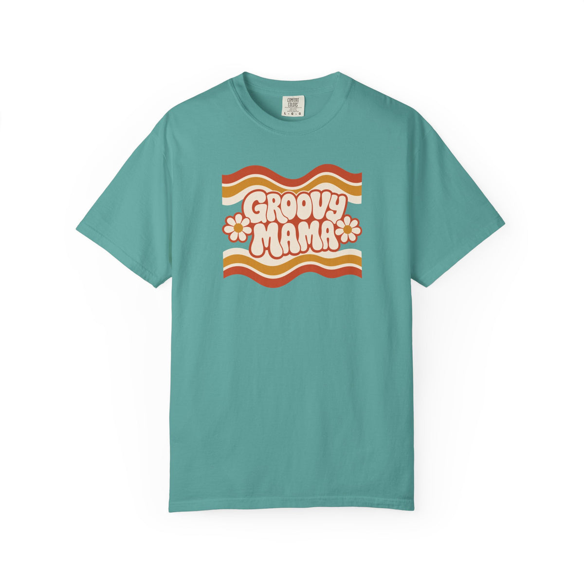 A teal short-sleeve crewneck t-shirt featuring a retro 1970s-style graphic on the chest with wavy orange and yellow stripes, the text 'GROOVY MAMA' in cream bubble letters, and two small orange flowers, displayed on a clean white background.