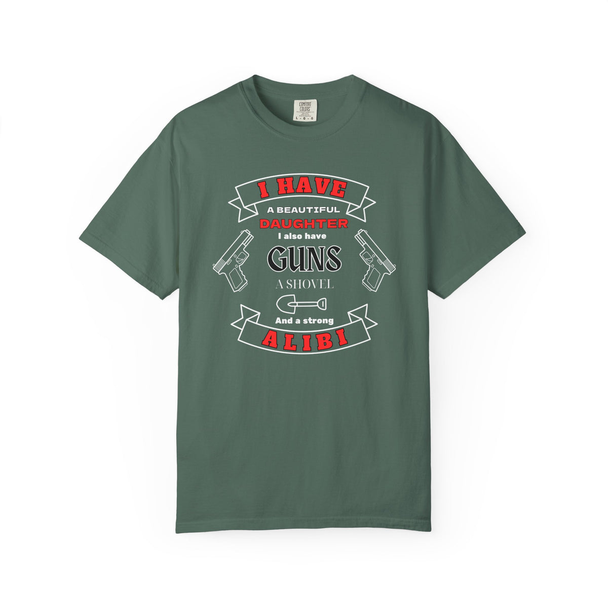 A green short-sleeve crewneck t-shirt with a graphic print on the front. The graphic features the text 'I have a beautiful daughter,i also have guns, a shovel and a strong alibi' in black and red lettering, accompanied by illustrations of two pistols and a shovel.