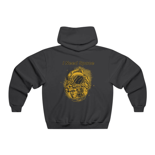 A black hoodie shown from the back, featuring a yellow graphic of an astronaut with the text 'I Need Space' above it, displayed on a clean white background.