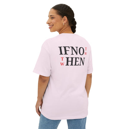 A woman wearing a light pink short-sleeve t-shirt shown from the back, featuring the text 'IF NOT NOW THEN WHEN' printed in black