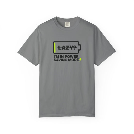 A gray t-shirt with a design of a uncharged battery and the text "LAZY? I'M IN POWER SAVING MODE" printed on the front.