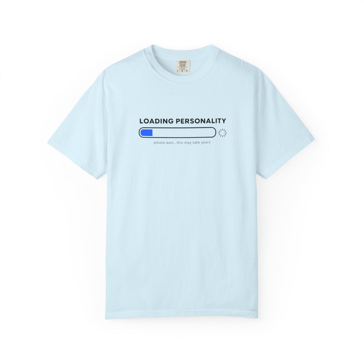 A light blue short-sleeve crewneck t-shirt with a graphic on the chest that reads 'LOADING PERSONALITY' above a progress bar with a blue filled segment and the text 'please wait.