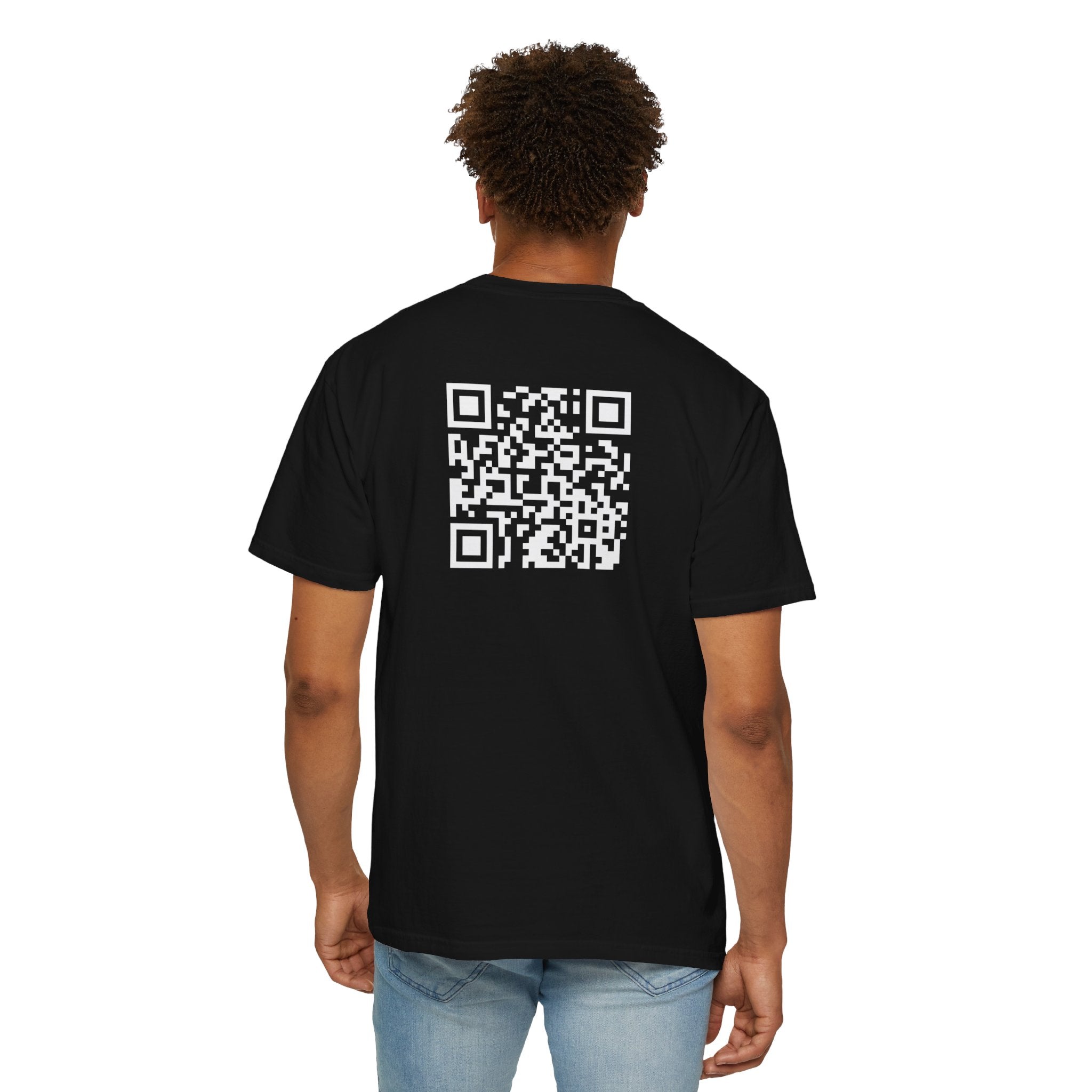 Person wearing a black t-shirt with a qr code on the back, standing against a white background.