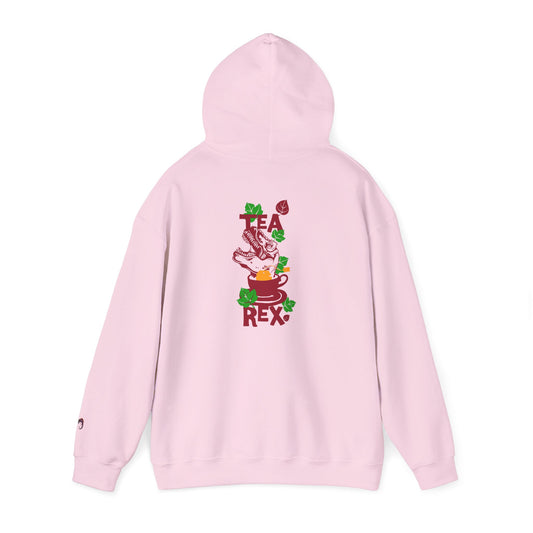 A pink hooded sweatshirt shown from the back, featuring a colorful graphic of a tea-themed character with the text 'TEA REX' in red and green accents.