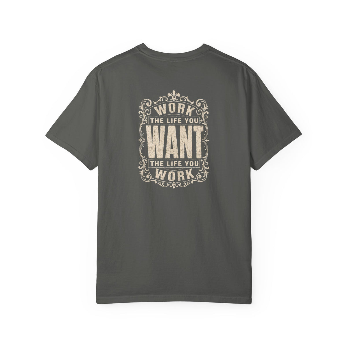 A gray short-sleeve crewneck t-shirt with a dark white graphic print on the back. The graphic features the motivational quote 'WORK THE LIFE YOU WANT THE LIFE YOU WORK' in a decorative, vintage-style frame.